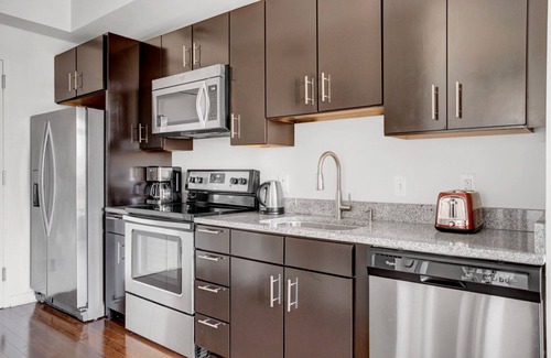 Woodmont Triangle Apartment | Sleek Bethesda Bainbridge 1BR w/Concierge, Gym, W/D, walk to Metro, by Blueground