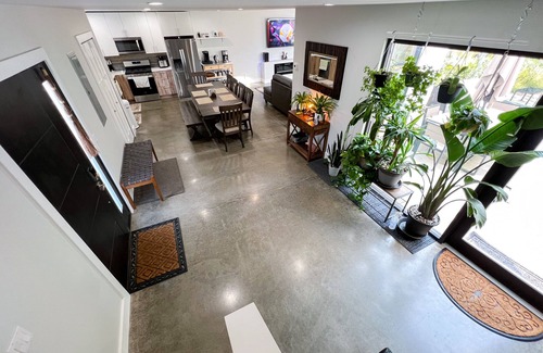 Stevensville House | Sleek forest retreat: karaoke, spa, campfire, pool table, grill, outdoor games