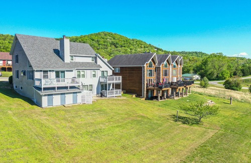 Holiday Island Condo | Sleeps 19 & location can’t be beat! Walk to water & marina.Summer booking fast!