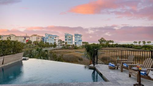 Palmetto Dunes House | Sleeps 24 Private Beach Boardwalk Infinity Pool 20 Bradley Cir by AvantStay