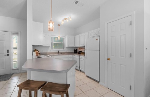 Navarre House | Sleeps 6- 2 bedrooms with private baths, crib, bay access, pool, mins to Beach!