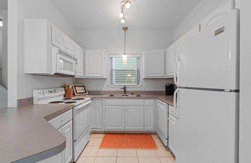 Navarre House | Sleeps 6- 2 bedrooms with private baths, crib, bay access, pool, mins to Beach!
