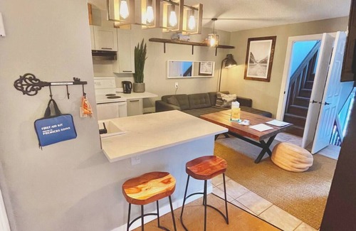 East Kootenay Condo | Small Cabin, Big Comfort. Ski-in/Ski-Out, Hike, Bike & Chill. Hot Tub & Sauna.