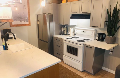 East Kootenay Condo | Small Cabin, Big Comfort. Ski-in/Ski-Out, Hike, Bike & Chill. Hot Tub & Sauna.