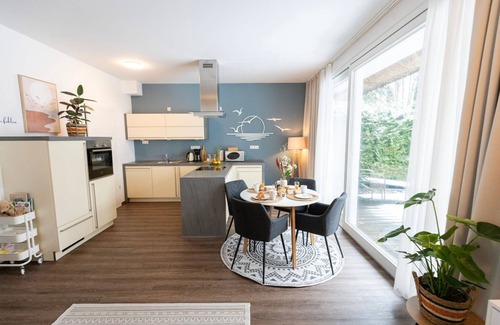 Bad Zwischenahn Apartment | SmartFewo: Fog greeting | lakeside terrace | sauna | park - Residence by the small sea