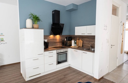 Bad Zwischenahn Apartment | SmartFewo: Set sail | lakeside terrace | sauna - Residence by the small sea
