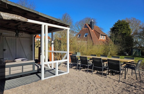 Altfunnixsiel Apartment | Smittshörn 3 - Ground floor apartments with fireplace, terrace & garden!