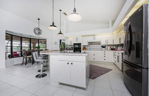 Port Charlotte Villa | Snowbird Jan Feb 2026 open luxury waterfront pool villa.