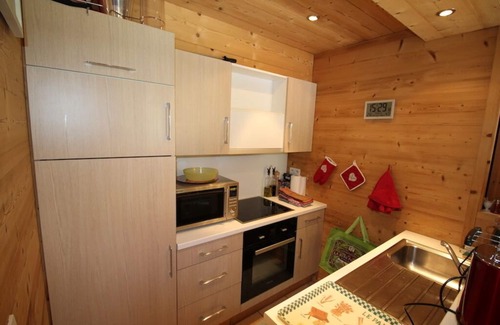 La Clusaz Apartment | snowfront Apartment 6 P skis in the village of La Clusaz
