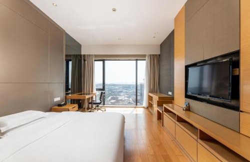 Haizhu Apartment | Snug Gaokong Jiangjing Hotel