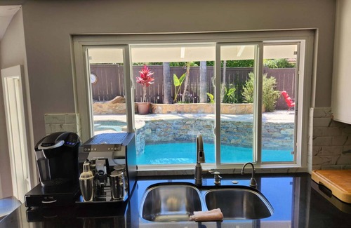 Carlsbad House | Soak in the sun with an outdoor entertainment area/pool/spa in relaxing Carlsbad