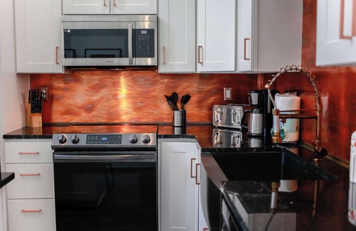 Norfolk - Virginia Beach Apartment | Sojourn 2 BR Steps to the Beach Sleeps 4