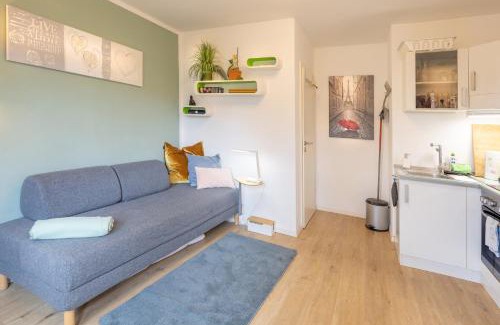 Munchen District Apartment | Sonnige, ruhige Gartenwohnung mit Terrasse u. Garten