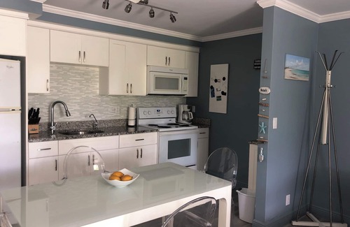 Williams Town Condo | Sophisticated And Sleek Ocean Front Accommodations!