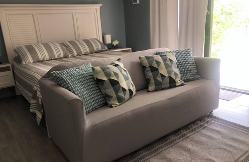Williams Town Condo | Sophisticated And Sleek Ocean Front Accommodations!