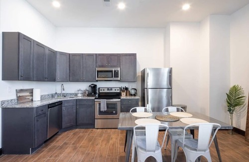 West Poplar Apartment | Sosuite | 2BR Penthouse w W/D, Gym, On-Site Bar