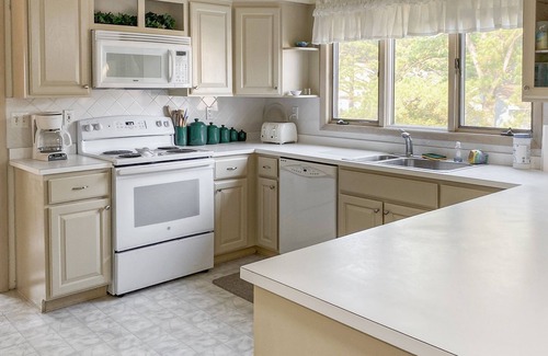 South Bethany Harbor House | South Bethany canal-front house w/grill, boat dock, and outdoor shower