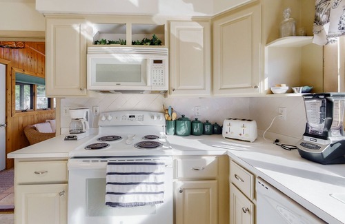 South Bethany Harbor House | South Bethany canal-front house w/grill, boat dock, and outdoor shower