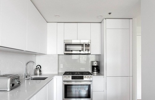 Telegraph Hill Apartment | South Boston 2BR w/ W/D, steps from Carson & M St. Beach by Blueground