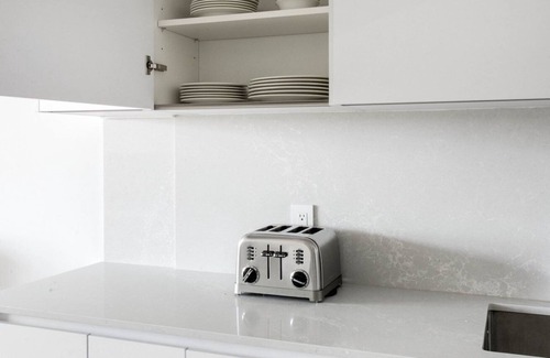 Telegraph Hill Apartment | South Boston 2BR w/ W/D, steps from Carson & M St. Beach by Blueground
