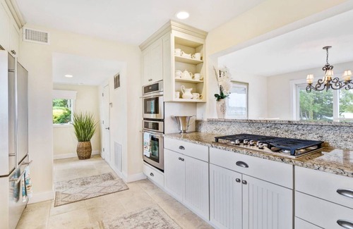 Shinnecock Hills House | Southampton WaterFront Cottage with Dock & Heated Pool
