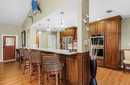 Fort Myers House | Southern Exposure with a Heated Pool/Spa, Standup Arcade on a Gulf Access Canal