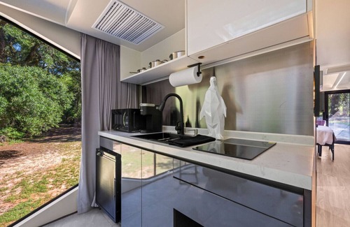 St. Stephen House | Space-Age Glamping Oasis - Immerse Yourself in Nature Without Sacrificing Comfort
