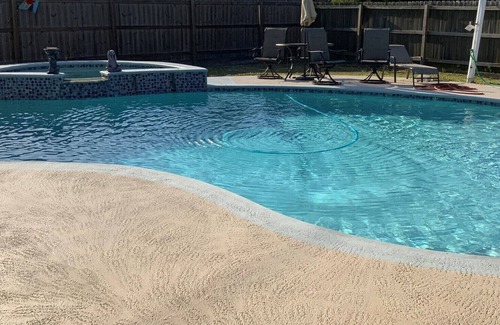 Interchange Square House | Space Coast 4 Bedroom Hot Tub and Pool Getaway - 10 min to beach!