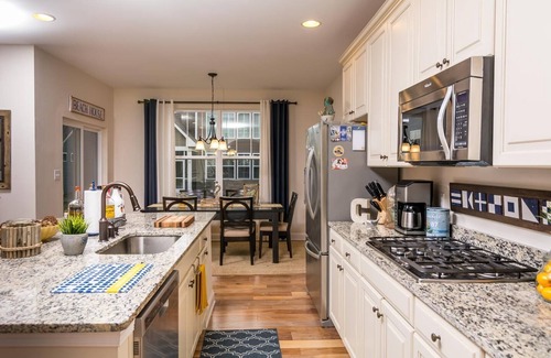 Millville House | Spacious 4 bedroom 3 bathroom home in Bishop's Landing community! Outdoor Pools, Fitness Center, Playground, Shuttle, Tennis!