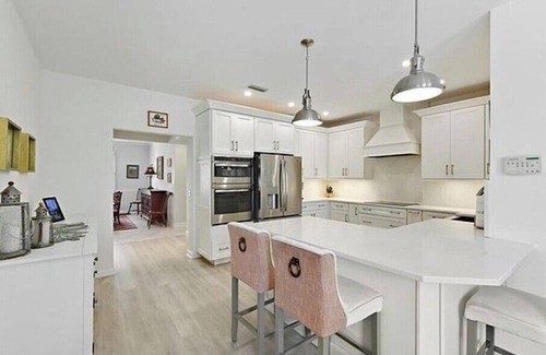 Palm City House | Spacious 4-bedroom house with AC, WiFi in charming Palm City