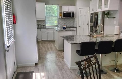 Lilburn House | Spacious 4-bedroom home with WiFi, AC/heat, and BBQ- grill in charming Lilburn.