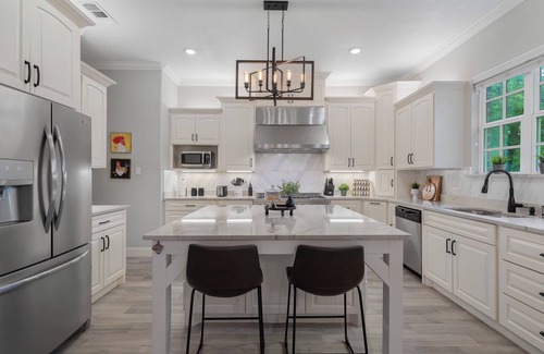 Irving House | Spacious 4-bedroom house near DFW, Hot Tub, Game Room, Backyard Playset
