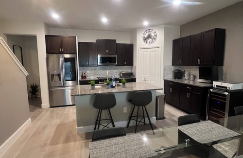 Palm River-Clair Mel House | Spacious 4-bedroom townhome with WiFi, AC in charming Tampa