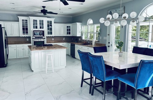 Mid America House | Spacious 8-bedroom house on lake in Hot Springs with pool & theater room