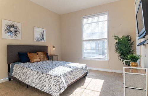 Dunwoody Apartment | Spacious Bedroom near major headquarters and shops