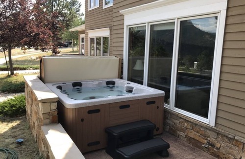 Stanley Hills Condo | Spacious, bright condo w/outdoor hot tub, and amazing views of Estes Valley!