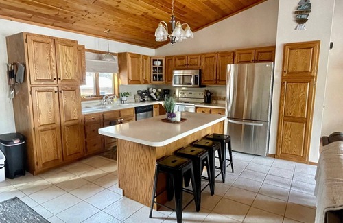 Wautoma Cabin | Spacious cabin on tranquil lake with kayaking, fishing. Arcade games, pool table