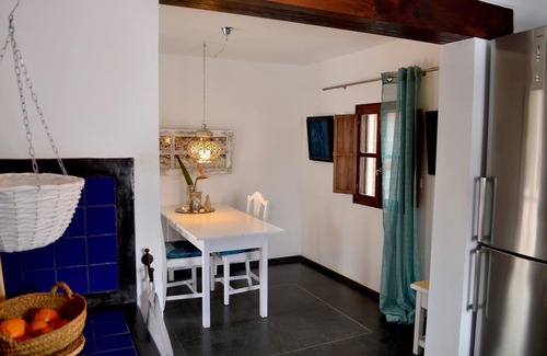 Uga House | Spacious, charming vacation apartment with private garden in historic FINCA