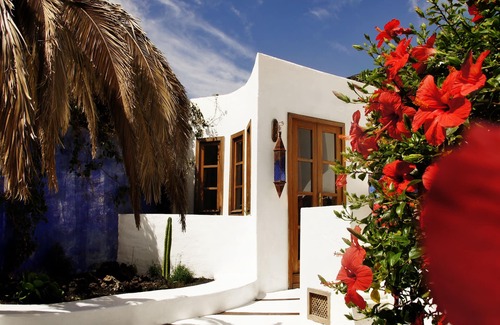 Uga House | Spacious, charming vacation apartment with private garden in historic FINCA
