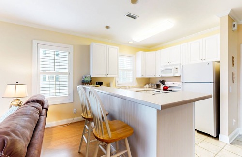 St. James Condo | Spacious condo with marina & Intercoastal views, screened-in balconies, W/D & AC