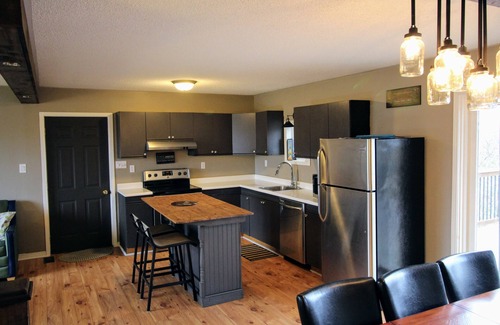 Carrying Place House | Spacious deck with BBQ, lots of seating for entertaining plus Outdoor bonfire