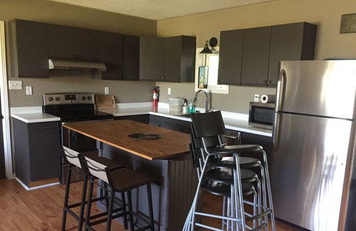 Carrying Place House | Spacious deck with BBQ, lots of seating for entertaining plus Outdoor bonfire