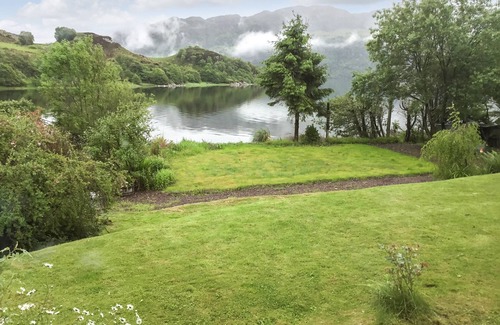 Nostie Cottage | Spacious detached bungalow set on the edge of Loch Alsh with direct access to the sea loch.