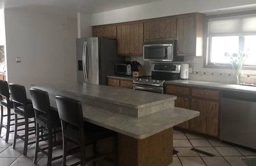 Milwaukee House | Spacious house, yard, hot tub & games — 1 mile to Downtown and the East Side