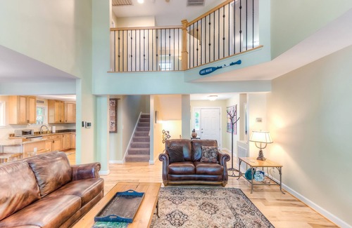 Blue Water House | Spacious lake lodge with a private dock, wraparound decks & foosball