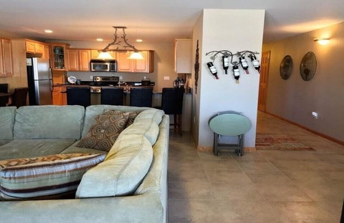 Arkdale Condo | Spacious lake view 1st floor condo at Northern Bay Marina & Golf Resort