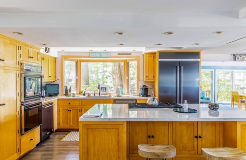 Shorewood-Tower Hills-Harbert House | Spacious lakefront home with private beach, hot tub, fire table, & views