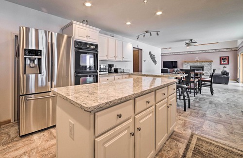 Rogers City House | Spacious Lakefront Home w/Sunroom & Bar!