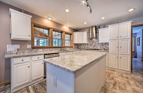 Rogers City House | Spacious Lakefront Home w/Sunroom & Bar!