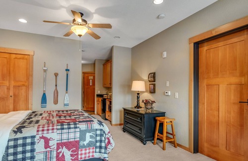 Three Lakes Condo | Spacious lakefront studio with kitchenette, balcony, pool, hot tubs, & firepit
